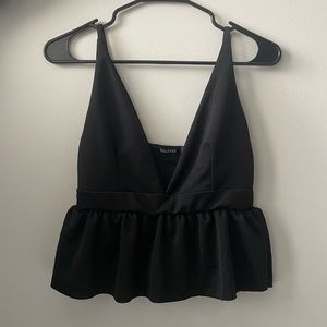 Black plunge front peplum top